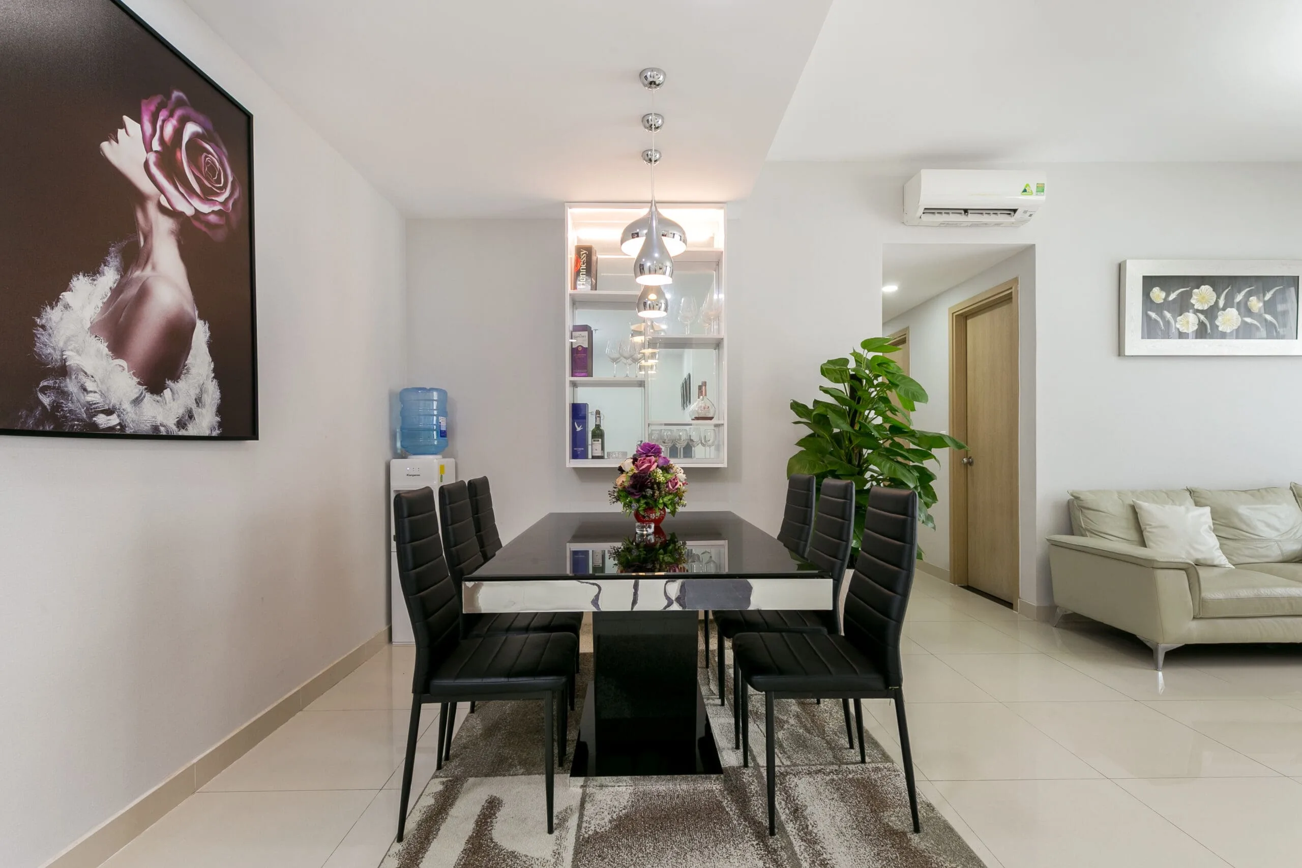 Dining table for six in Three-Bedroom Apartment at RiverGate Residence