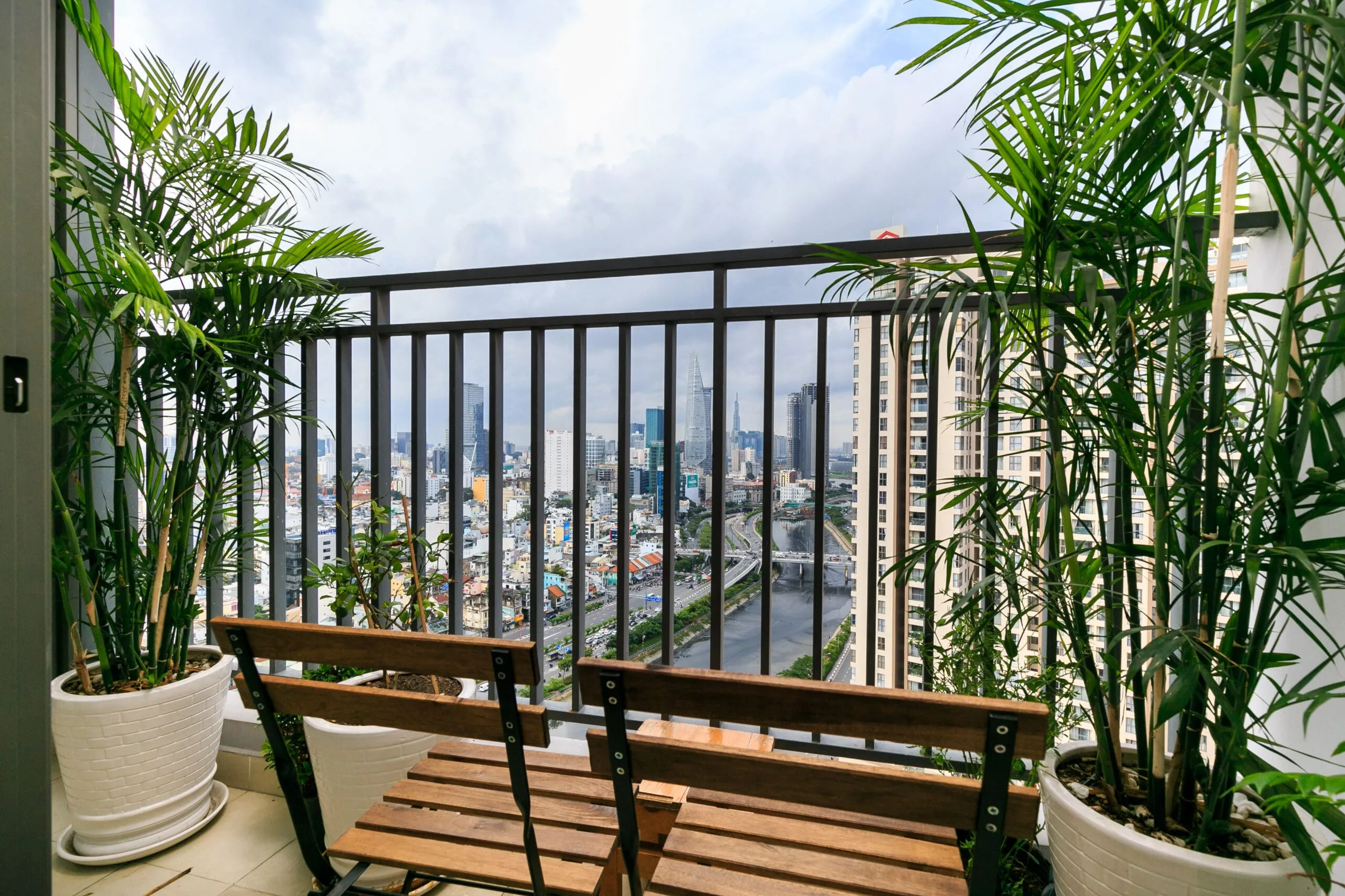 Ben Nghe Canal and city view from Three-Bedroom Apartment balcony at RiverGate Residence