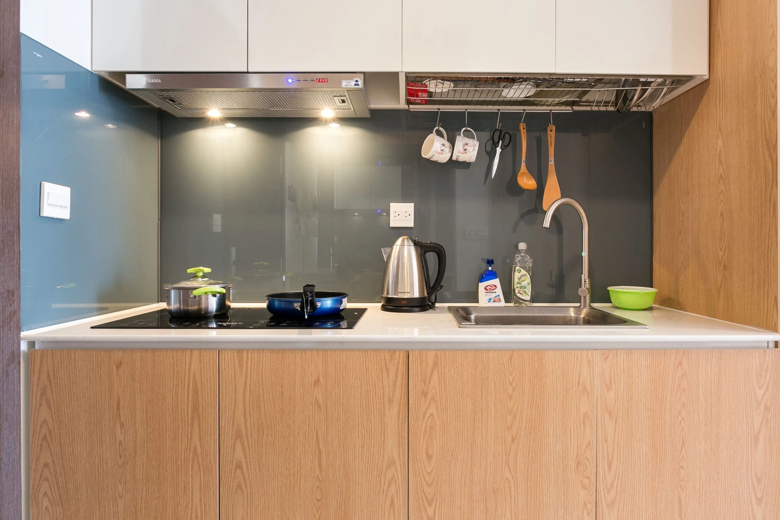 Fully equipped kitchen in Studio Apartment at RiverGate Residence