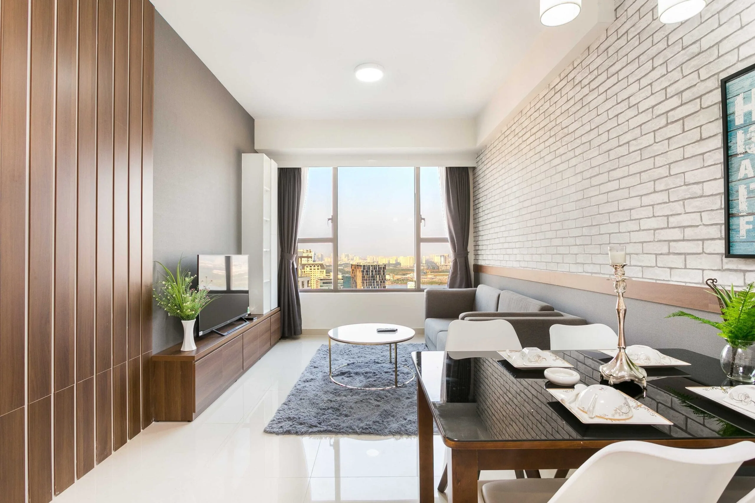 Spacious living area in Two-Bedroom Apartment at RiverGate Residence