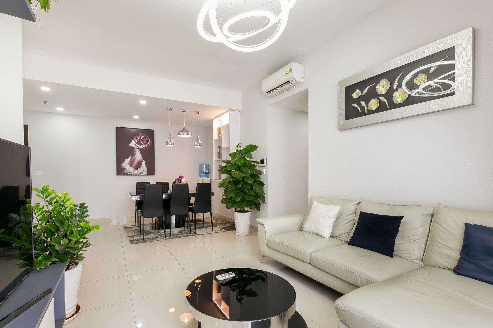 Spacious living room in the Three-Bedroom Apartment at RiverGate Residence