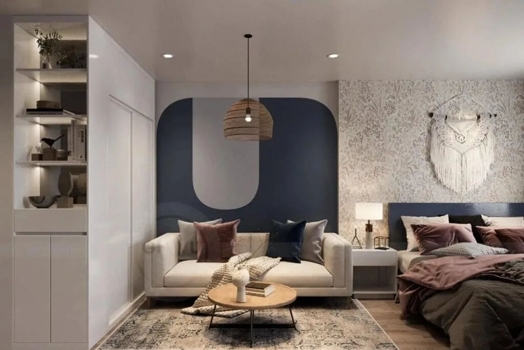 Modern 28–30m² studio apartment at RiverGate Residence with full furnishings, sofa, bed, and stylish decor